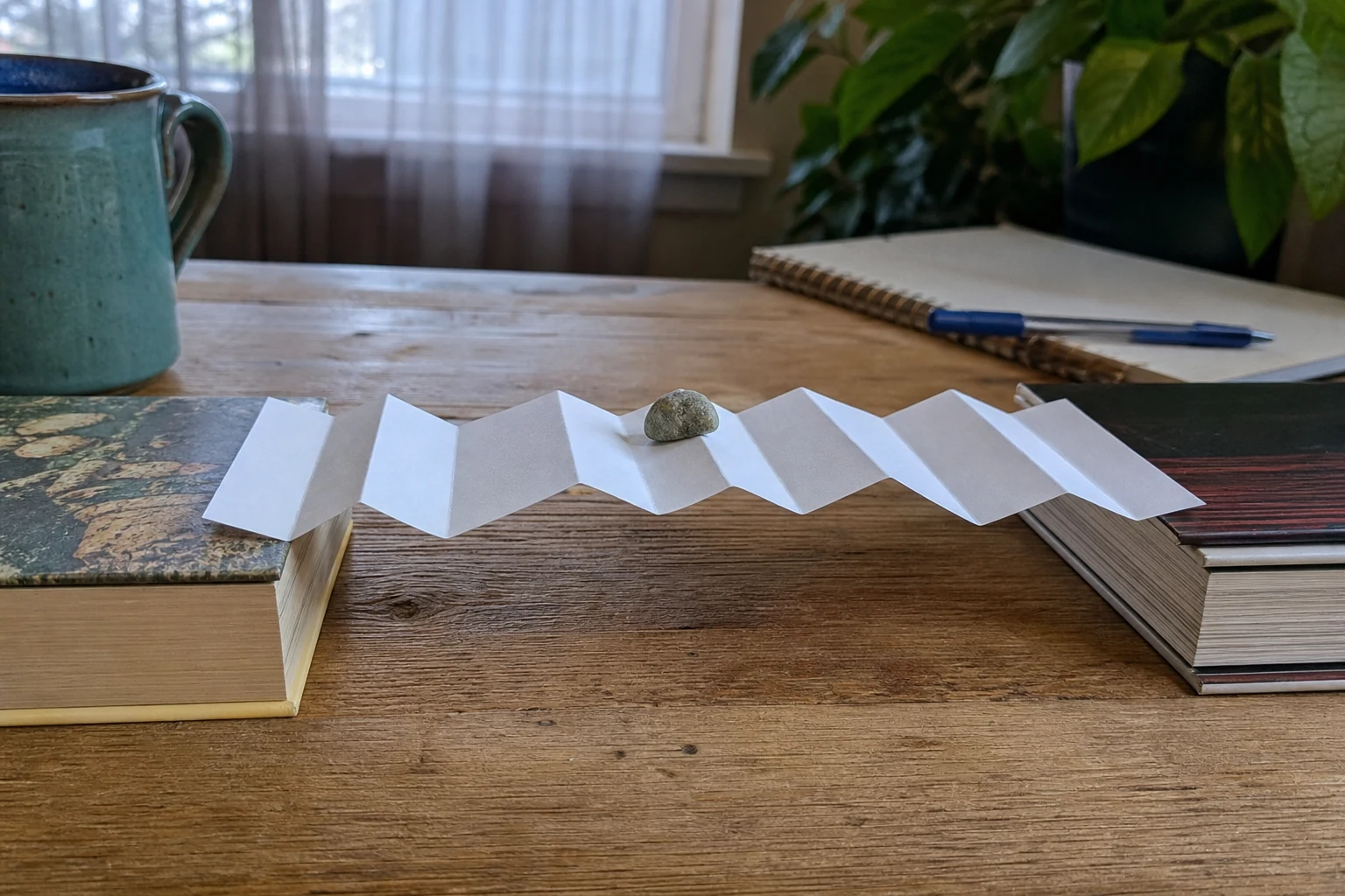Cover for One sheet of paper versus one tiny pebble