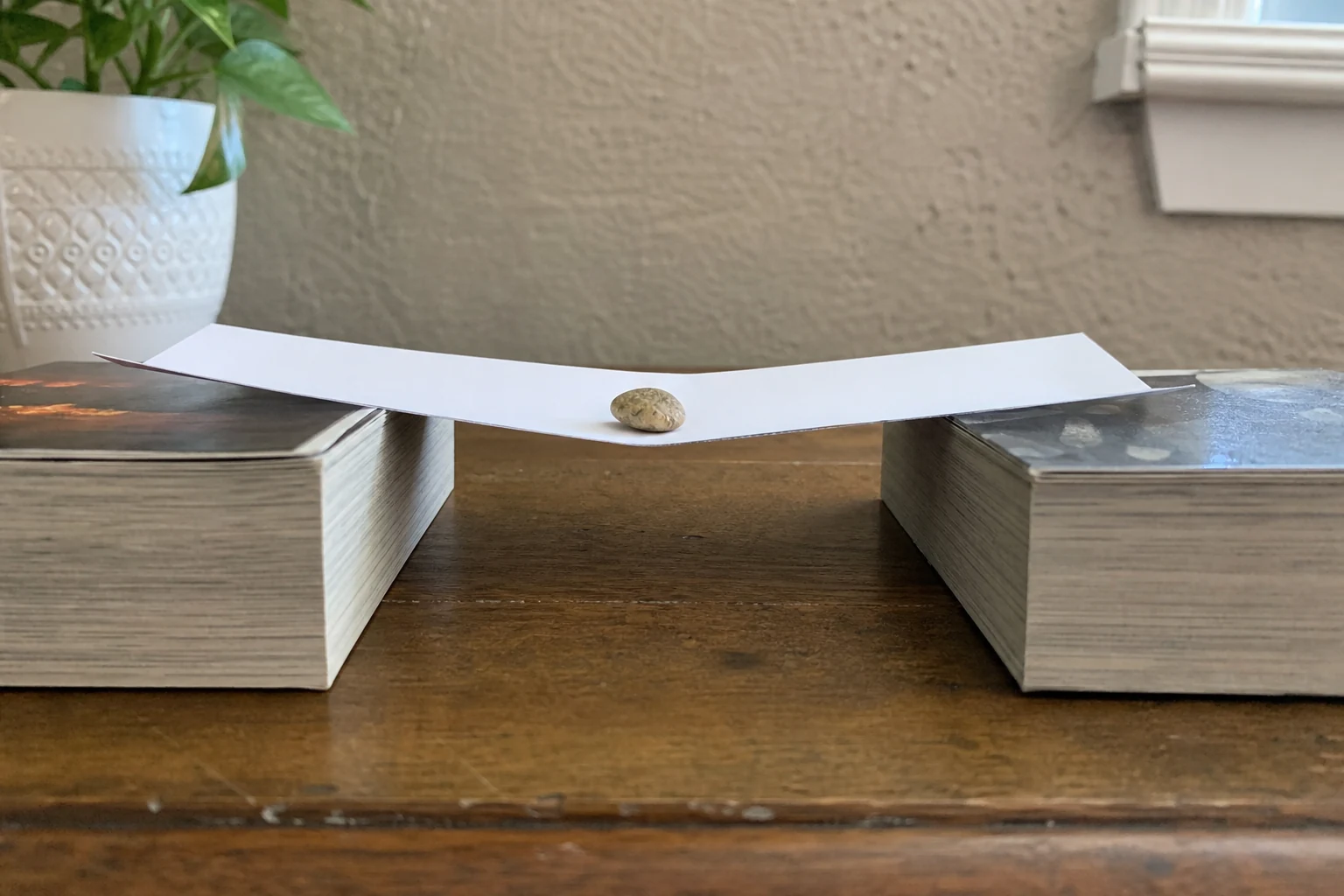 Shared version of One sheet of paper versus one tiny pebble