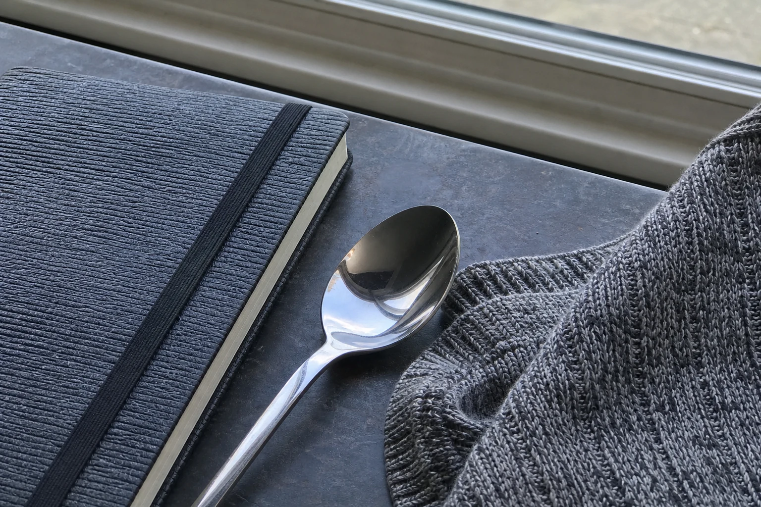 Shared version of A spoon, a sleeve, and a notebook cover